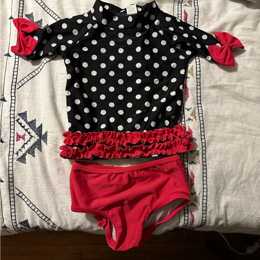 Ruffle Butts two piece polka dot swim suit.